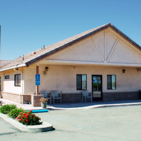 View of the clubhouse at Flag City RV Resort in Lodi, CA.